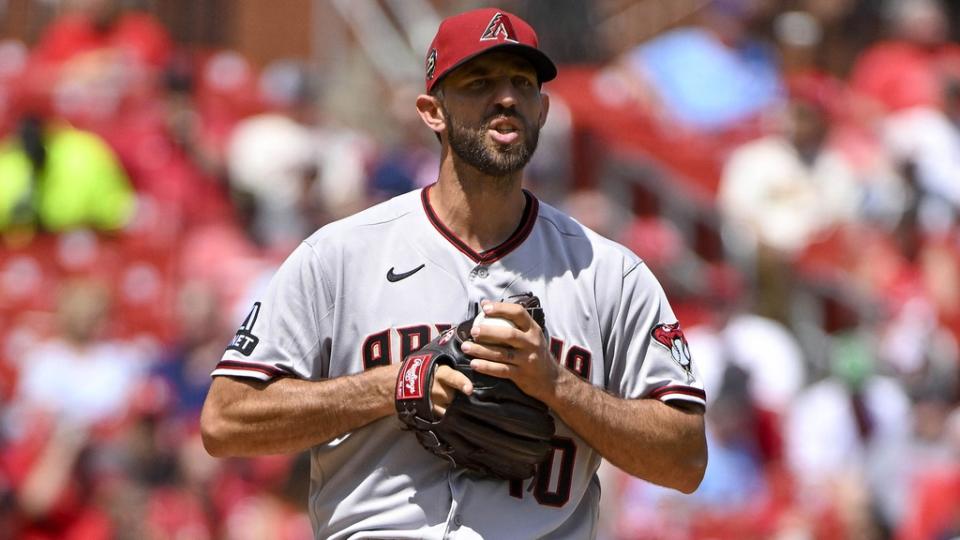 Apr 19, 2023; St. Louis, Missouri, USA; Arizona Diamondbacks starting pitcher Madison Bumgarner (40) exchanges words with St. Louis Cardinals designated hitter Willson Contreras (not pictured) during the third inning at Busch Stadium.