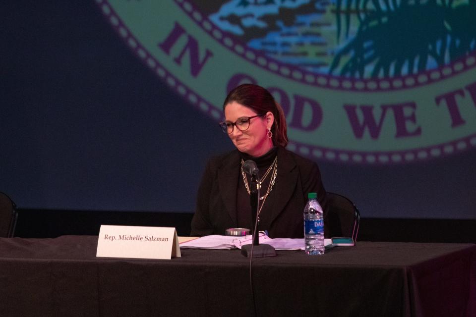 State Rep. Michelle Salzman, R-Pensacola, listens to speakers at the annual delegation meeting at Pensacola State College on Tuesday.