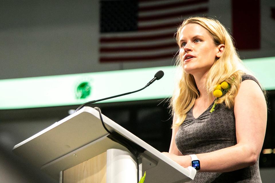 Frances Haugen, Iowa City West High School Class of 2002, speaks during a commencement ceremony Sunday at Xtream Arena in Coralville. Haugen, who gained fame last year as the "Facebook whistleblower," was honored with the Distinguished Alumni Award.