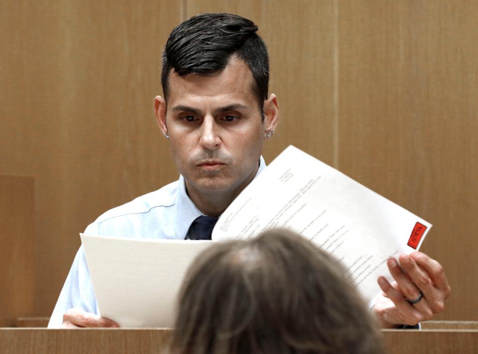 Richard Cicerone, a state Division of Child Protection and Permanency employee who fielded a phone call from Christopher Gregor, goes over transcripts in Superior Court Judge Guy P. Ryan's courtroom in Toms River Thursday, May 2, 2024. Gregor is on trial for the murder of his 6-year-old son.