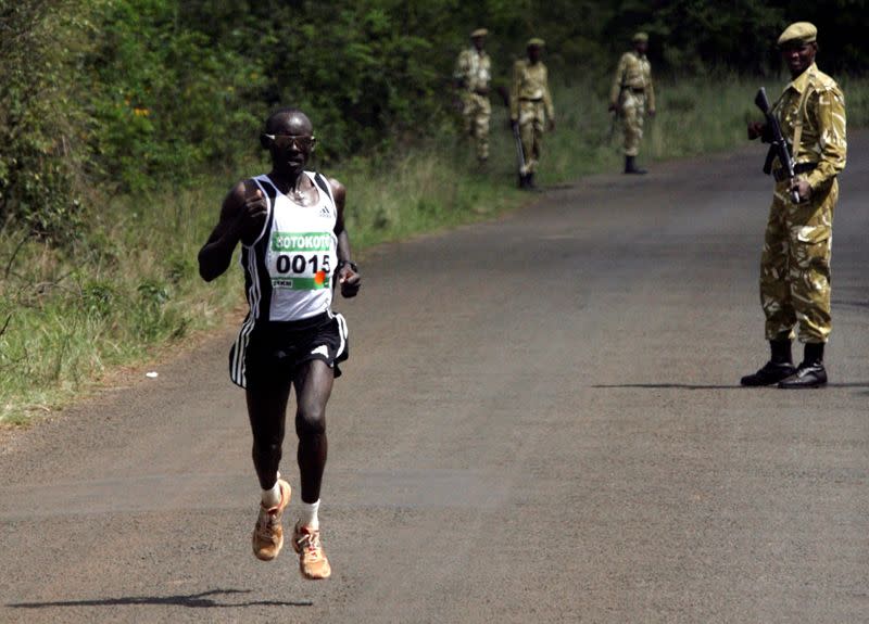 FILE PHOTO: Kenya's David Tarus sprints to victory in the inaugural Sotokoto Safari Half Marathon at Nairobi National Park.