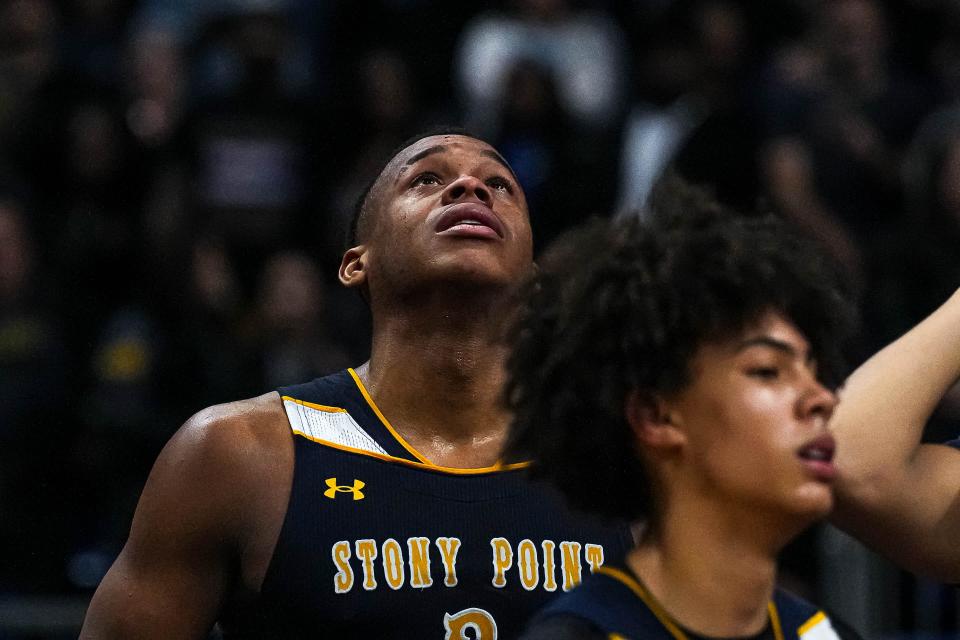 Stony Point star Josiah Moseley reacts to the Tigers' 53-41 loss to Plano East in the UIL Class 6A state championship game at the Alamodome in San Antonio. The Villanova signee and reigning Central Texas player of the year finished with 18 points and 12 rebounds in his final high school game.