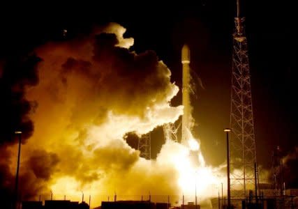 FILE PHOTO: A remodeled version of the SpaceX Falcon 9 rocket lifts off at the Cape Canaveral Air Force Station on the launcherâ€™s first mission since a June failure in Cape Canaveral, Florida, December 21, 2015. The rocket carried a payload of eleven satellites owned by Orbcomm, a New Jersey-based communications company. The first stage returned to land following launch.  REUTERS/Joe Skipper