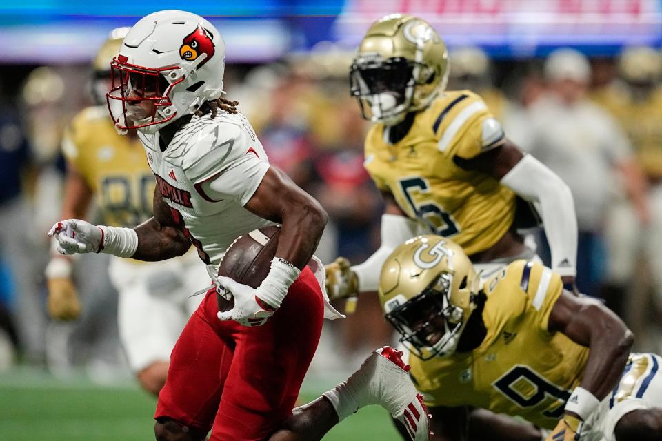 Louisville's Kevin Coleman runs with the ball in Friday's win vs. Georgia Tech.