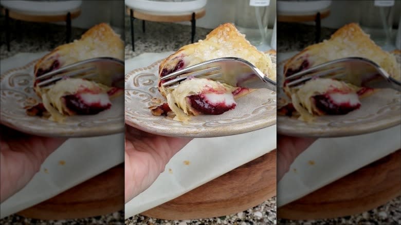 Eating Aldi cherry mascarpone strudel with fork