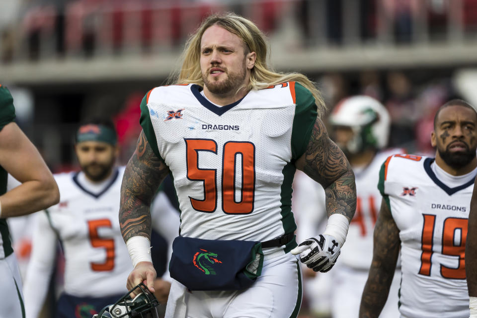 Dillon Day #50 of the Seattle Dragons walks on the field during the first half of the XFL game against the DC Defenders at Audi Field on February 8, 2020 in Washington, DC. (Photo by Scott Taetsch/Getty Images)