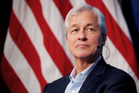 FILE PHOTO: Jamie Dimon, CEO of JPMorgan Chase, takes part in a panel discussion about investing in Detroit at the Kennedy School of Government at Harvard University in Cambridge, Massachusetts, U.S., April 11, 2018. REUTERS/Brian Snyder/File Photo
