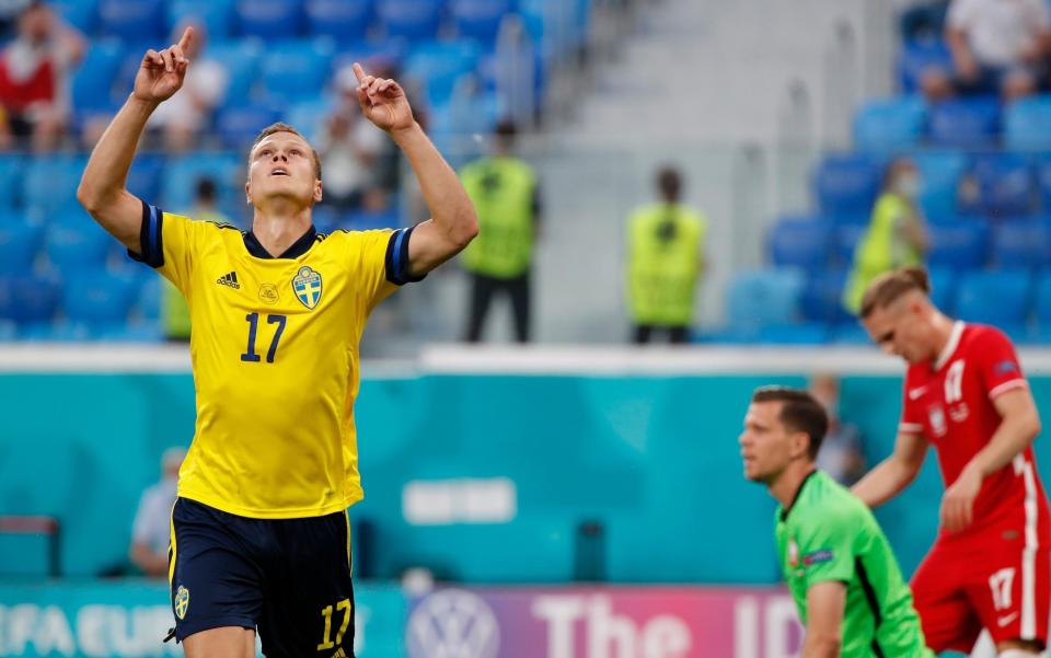 Viktor Claesson celebrates after making it 3-2 to Sweden at the death - GETTY IMAGES