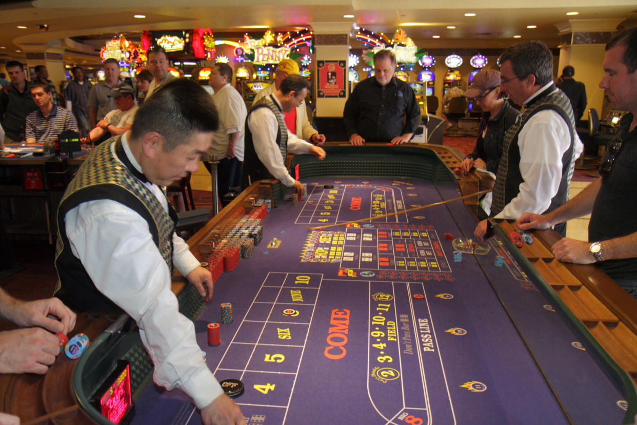 Harrah's Las Vegas Hotel box dealer. (Photo by: Jeffrey Greenberg/Universal Images Group via Getty Images)