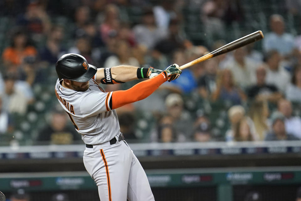 San Francisco Giants' Evan Longoria hits a two-run home run against the Detroit Tigers in the sixth inning of a baseball game in Detroit, Tuesday, Aug. 23, 2022. (AP Photo/Paul Sancya)