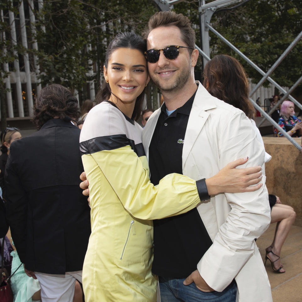 Model Kendall Jenner, left, and author Derek Blasberg attend the Longchamp runway show at Lincoln Center during NYFW Spring/Summer 2020 on Saturday, Sept. 7, 2019, in New York. (Photo by Brent N. Clarke/Invision/AP