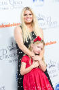 <p>The singer-fashionista and her daughter, Maxi, walked the red carpet at the Princess Grace Awards Gala kick-off party in L.A. on Tuesday. (Photo: Greg Doherty/Getty Images) </p>