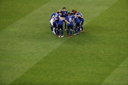 Soccer Football - World Cup - Round of 16 - Belgium vs Japan - Rostov Arena, Rostov-on-Don, Russia - July 2, 2018 Japan players huddle before the second half REUTERS/Murad Sezer