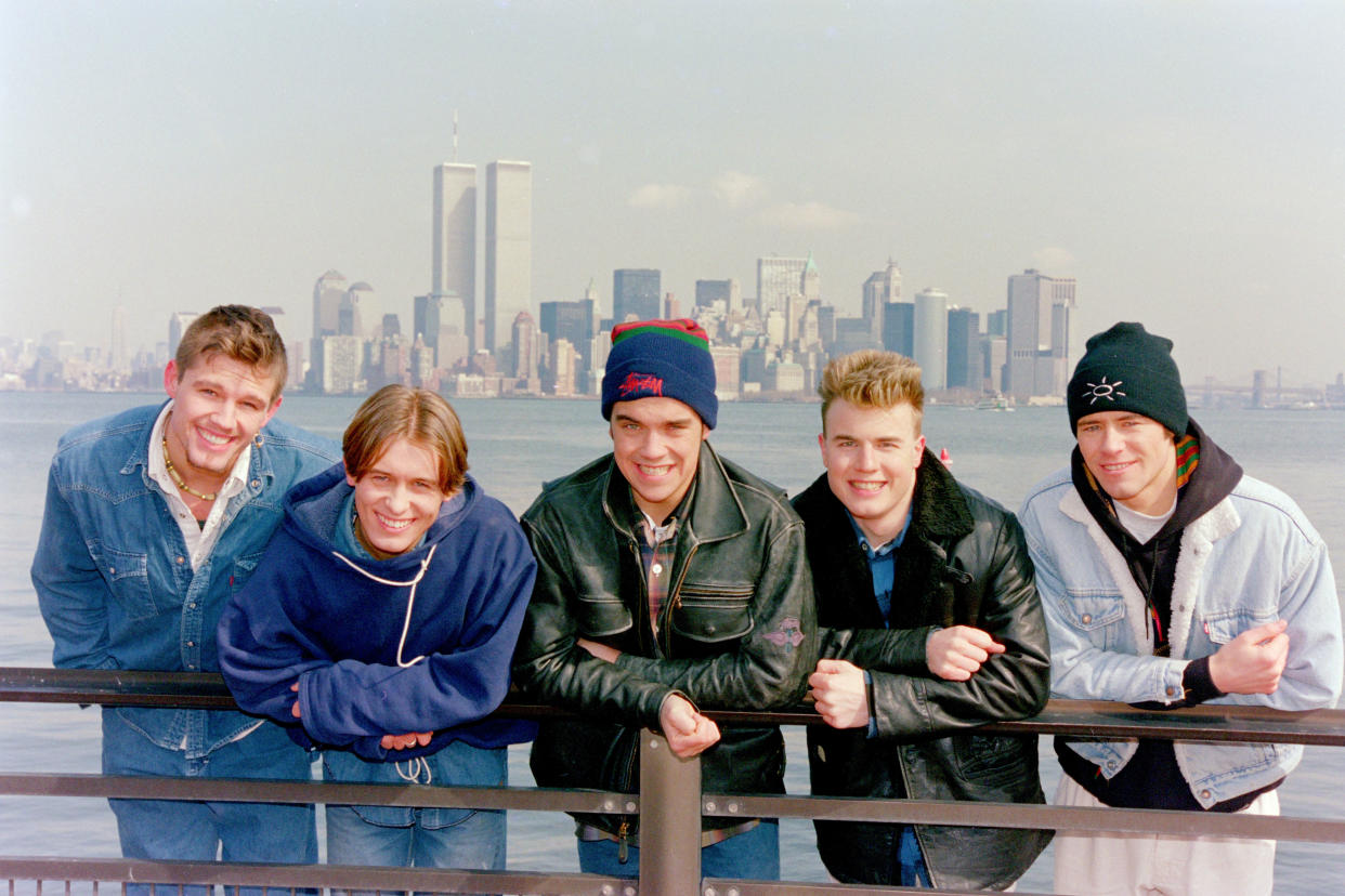 Mark Owen, Howard Donald, Gary Barlow, Robbie Williams and Jason Orange of Take That in New York, 1995 (Photo by DaveHogan/Getty Images)