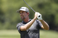 Webb Simpson watches his drive on the second tee during the third round of the Rocket Mortgage Classic golf tournament Saturday, July 4, 2020, at Detroit Golf Club in Detroit. (AP Photo/Carlos Osorio)