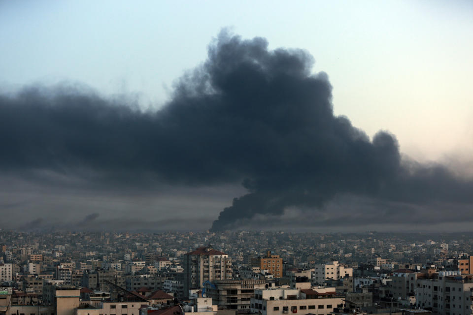 Black smoke raise from Eastern Gaza City, Thursday, Oct. 26, 2023 following Israeli airstrikes. (AP Photo/Abed Khaled)