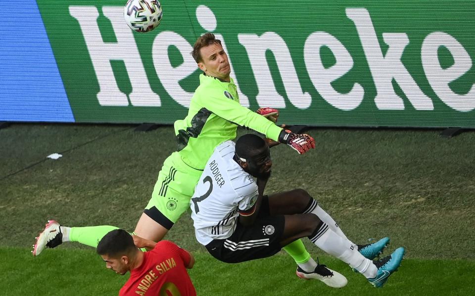 Ruidger and Neuer clash - AFP