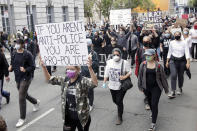 People march toward City Hall during a protest over the Memorial Day death of George Floyd, a handcuffed black man in police custody in Minneapolis, in San Francisco, Saturday, May 30, 2020. (AP Photo/Jeff Chiu)