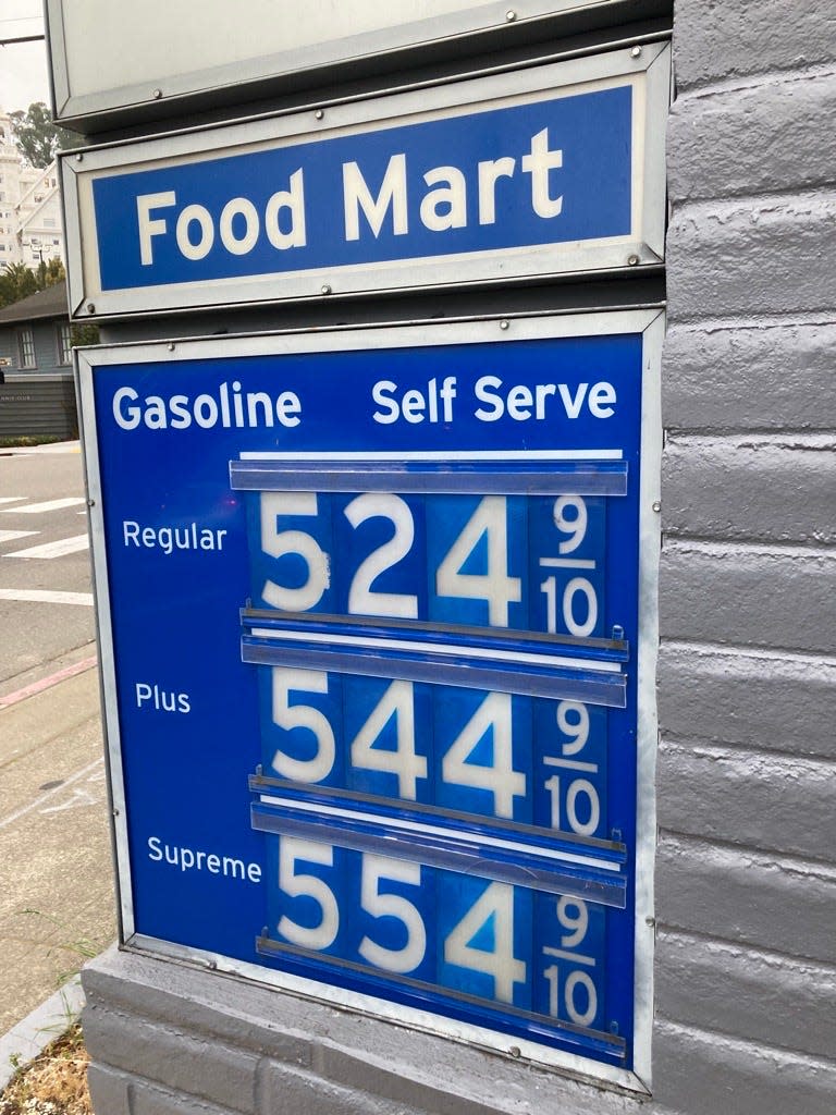 Gasoline prices displayed at a station in Berkeley, California on March 3, 2022. Gas prices in California are approaching $5 on average for a gallon of regular, according to GasBuddy and the American Automobile Association.