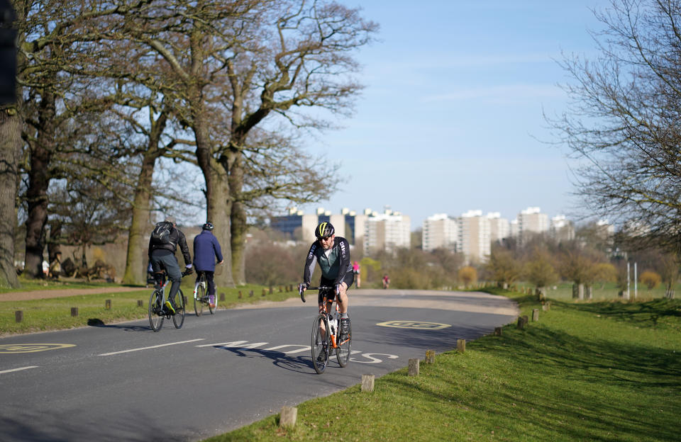 Members of the public exercise in Richmond Park, London the day after Prime Minister Boris Johnson put the UK in lockdown to help curb the spread of the coronavirus. (Photo by John Walton/PA Images via Getty Images)