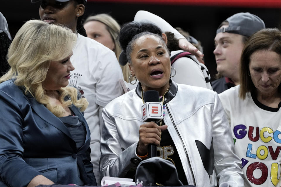 South Carolina head coach Dawn Staley is interviewed after the Final Four college basketball championship game against Iowa in the women's NCAA Tournament, Sunday, April 7, 2024, in Cleveland. South Carolina won 87-75. (AP Photo/Morry Gash)