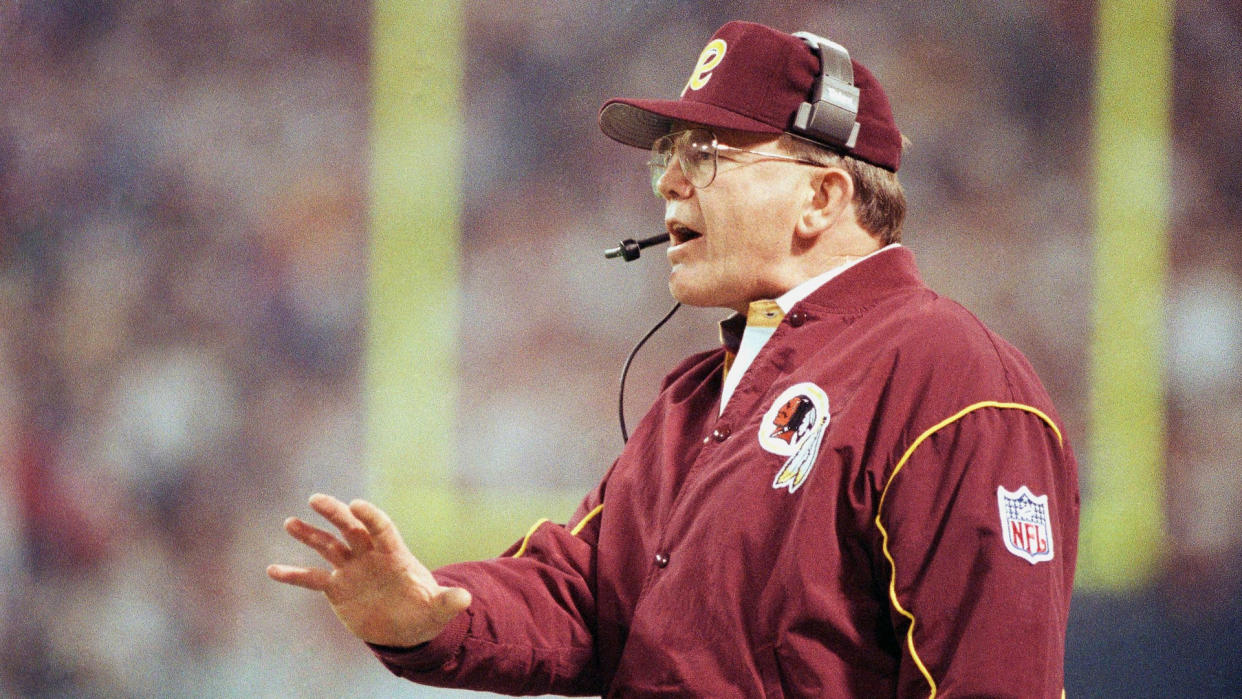 Mandatory Credit: Photo by John Gaps/AP/Shutterstock (6567253a)Washington Redskins coach Joe Gibbs helps from the sideline during Super Bowl game with the Buffalo Bills in Minneapolis onNFL Superbowl XXVI Redskins Bills, Minneapolis, USA.