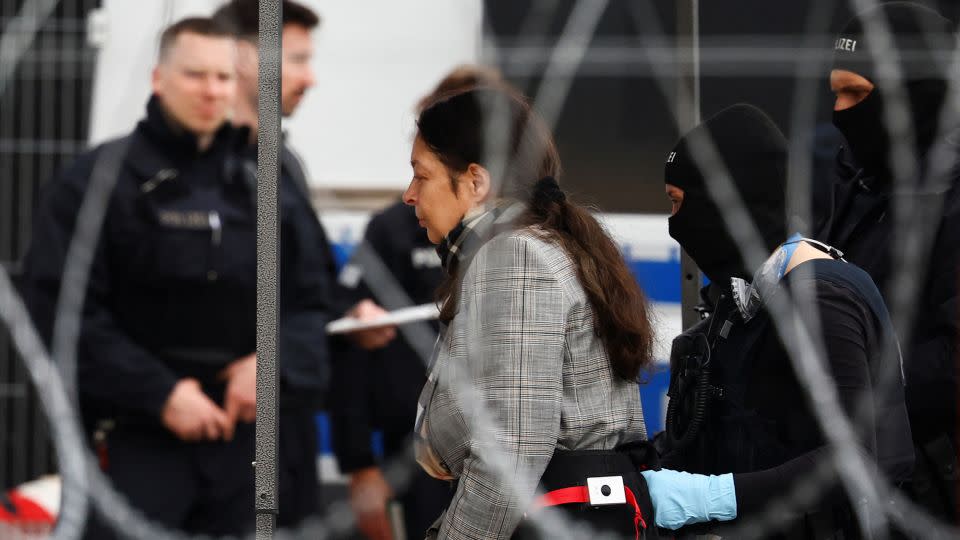 Birgit Malsack-Winkemann, a former judge, attends the Frankfurt trial on Tuesday. The former lawmaker allegedly led co-defendants around the Reichstag parliament to scout the site for a coup plot. - Kai Pfaffenbach/Reuters