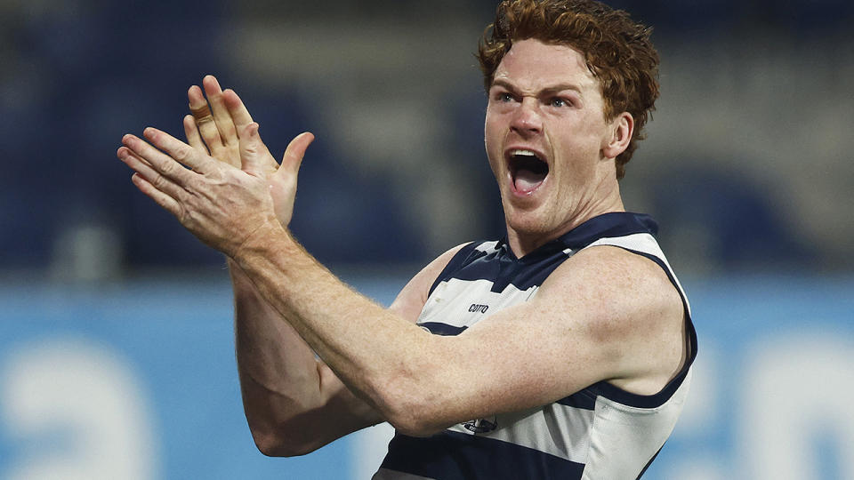 Gary Rohan had the perfect response after his collision with teammate Jeremy Cameron, booting three goals to steer the Cats to a crucial win over Melbourne. (Photo by Daniel Pockett/Getty Images)