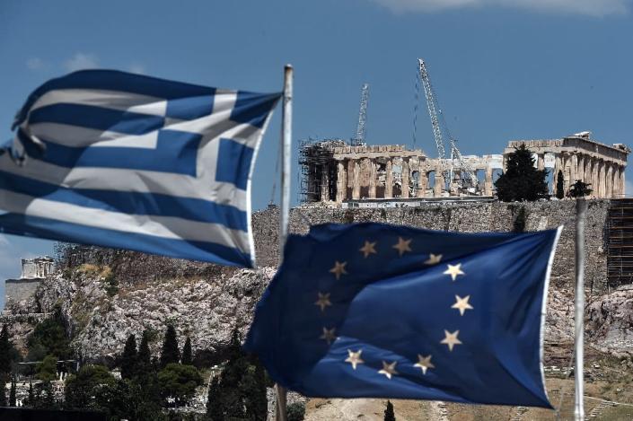 There are deep divisions between European creditors led by Germany, and the IMF, which believes that the Europeans' expectations of Greece's economic performance are too ambitious (AFP Photo/Aris MESSINIS)