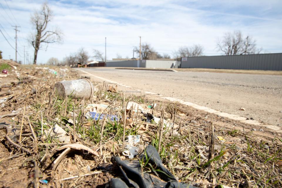 Trash lines the side of the road Feb. 21 on S Bryant Avenue between SE 29 and SE 44 in Oklahoma City.