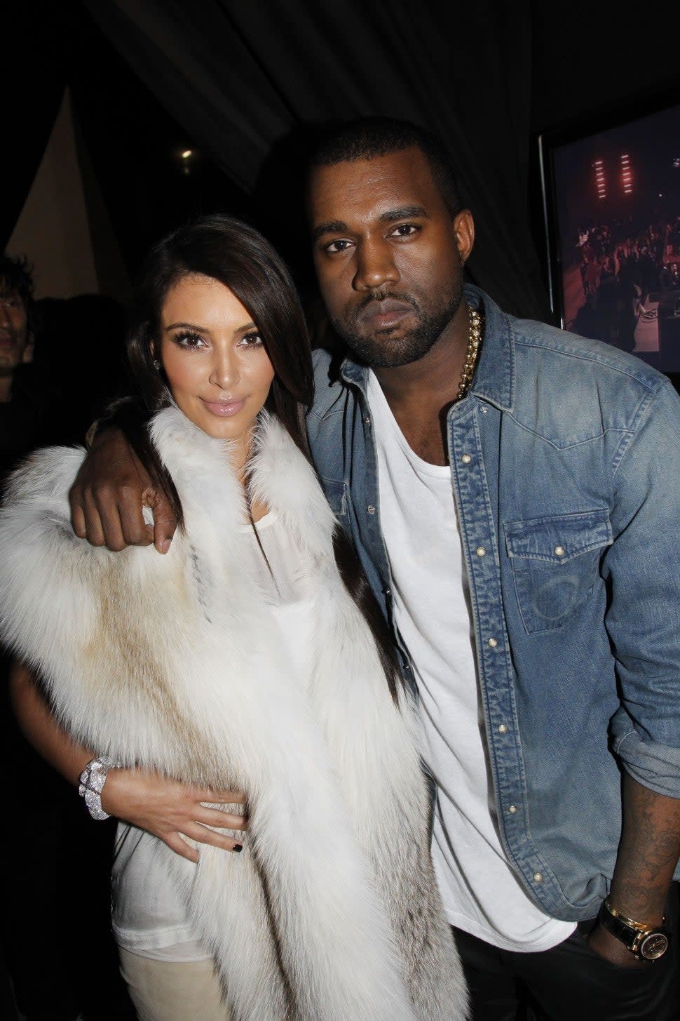 Kim Kardashian and Kanye West attend the Kanye West Ready-To-Wear Fall/Winter 2012 show as part of Paris Fashion Week at Halle Freyssinet on March 6, 2012 in Paris, France.