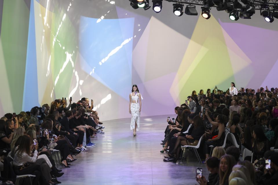 A model wears a creation for the Elie Saab ready-to-wear Spring/Summer 2023 fashion collection presented Saturday, Oct. 1, 2022 in Paris. (Photo by Vianney Le Caer/Invision/AP)