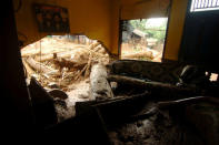 Trees' trunks as seen inside a house after a landslide hit Pasir Panjang village in Brebes, Indonesia, February 23, 2018. Antara Foto/Oky Lukmansyah/ via REUTERS