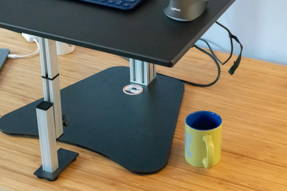 Standing desk converters