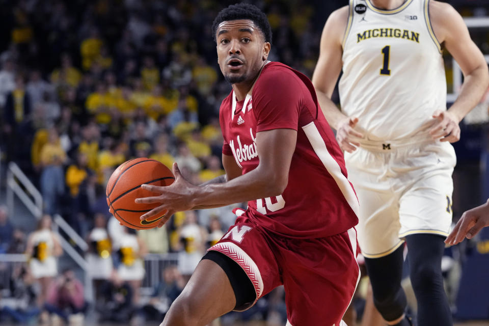 Nebraska guard Jamarques Lawrence (10) drives to the basket during the first half of an NCAA college basketball game Michigan, Wednesday, Feb. 8, 2023, in Ann Arbor, Mich. (AP Photo/Carlos Osorio)
