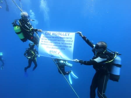 Ray Woolley, diver and World War Two veteran, is seen underwater during an attempt to break a new diving record as he turns 96 by taking the plunge at the Zenobia, a cargo ship wreck off the Cypriot town of Larnaca