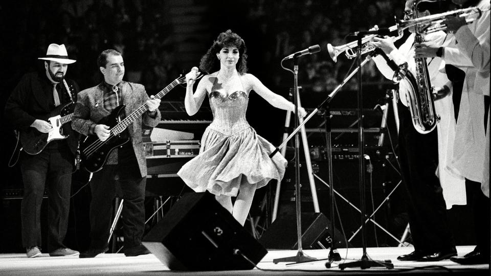 Mandatory Credit: Photo by AP/Shutterstock (7380758a)Estefan Singer Gloria Estefan leads her band Miami Sound Machine of the United States in a performance during the 15th Tokyo Music Festival in Tokyo, Japan, .