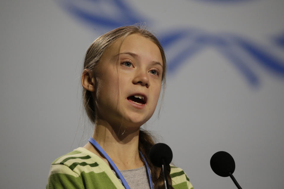 Swedish climate activist Greta Thunberg addresses plenary of U.N. climate conference during with a meeting with leading climate scientists at the COP25 summit in Madrid, Spain, Wednesday, Dec. 11, 2019. Thunberg is in Madrid where a global U.N.-sponsored climate change conference is taking place. (AP Photo/Paul White)