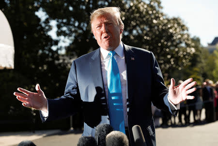 FILE PHOTO: U.S. President Donald Trump talks to reporters as he departs for travel to Texas from the White House in Washington, U.S., April 10, 2019. REUTERS/Kevin Lamarque