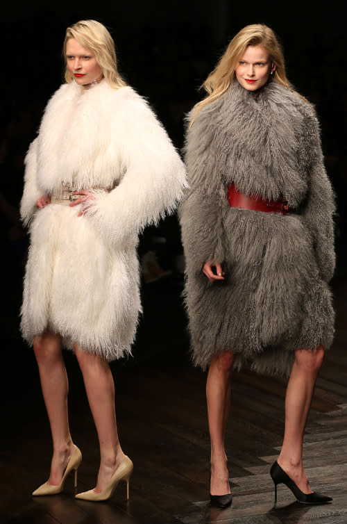 <b>London Fashion Week AW13: Felder Felder</b><br><br>Hugh fluffy coats, big belts and red lips. We love!<br><br>©PA