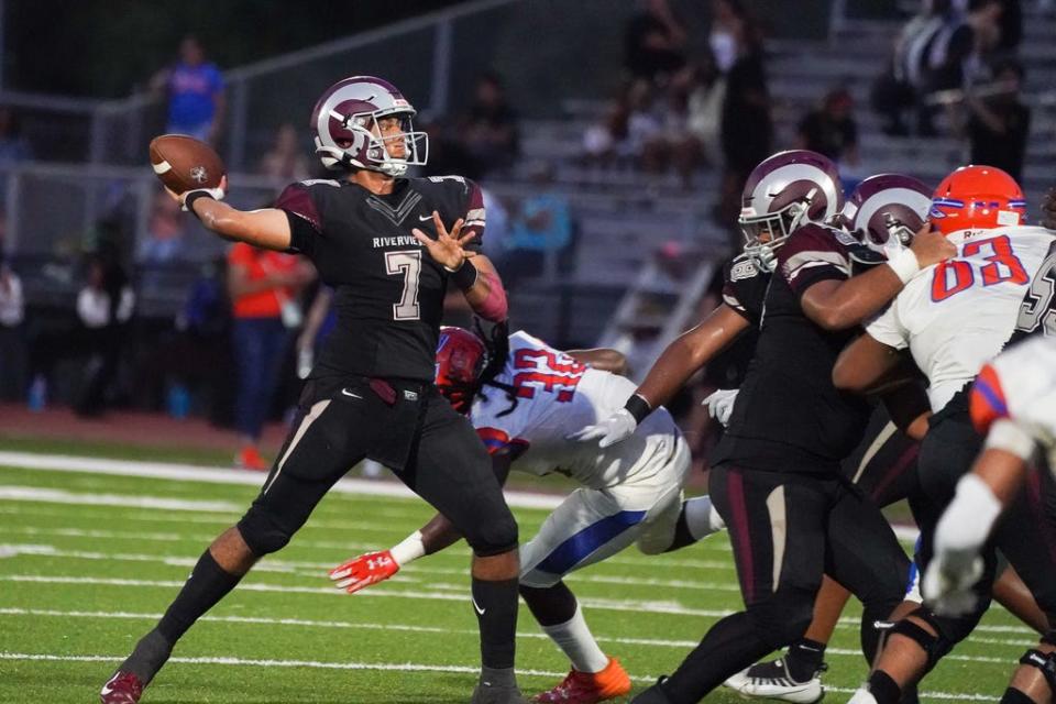 A Riverview quarterback Braxton Thomas throws during Friday night's game against Southeast.