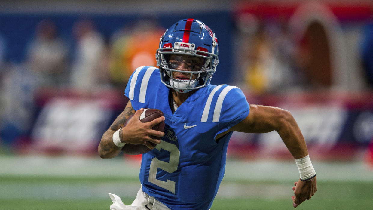 Mississippi quarterback Matt Corral (2) runs the ball during the second half of an NCAA football game against Louisville on Monday, Sept. 6, 2021, in Atlanta. (AP Photo/Danny Karnik)