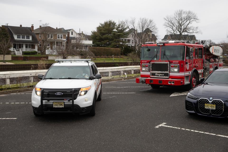 Members of the Asbury Park Fire Department keep an eye on Wesley Lake as the storm approaches. Rain begins to fall as a strong storm moves into the Jersey Shore area.  
Asbury Park, NJ
Tuesday, January 9, 2024