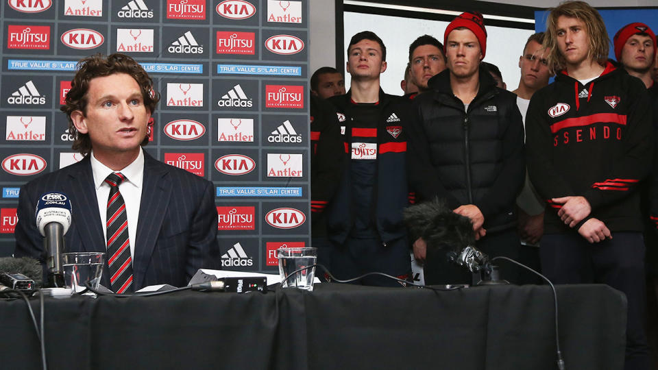 James Hird is pictured announcing he will no longer coach the Essendon Bombers during a 2015 press conference.