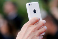 A guest uses her Iphone to take pictures in Cannes, France, May 12, 2016. REUTERS/Regis Duvignau/File Photo