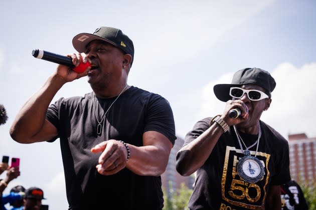 Chuck D and Flavor Flav of Public Enemy perform onstage during the Hip Hop 50th Birthday Jam By Universal Hip Hop Museum at Mill Pond Park on August 11, 2023 in New York City. - Credit: Richard Bord/Getty Images