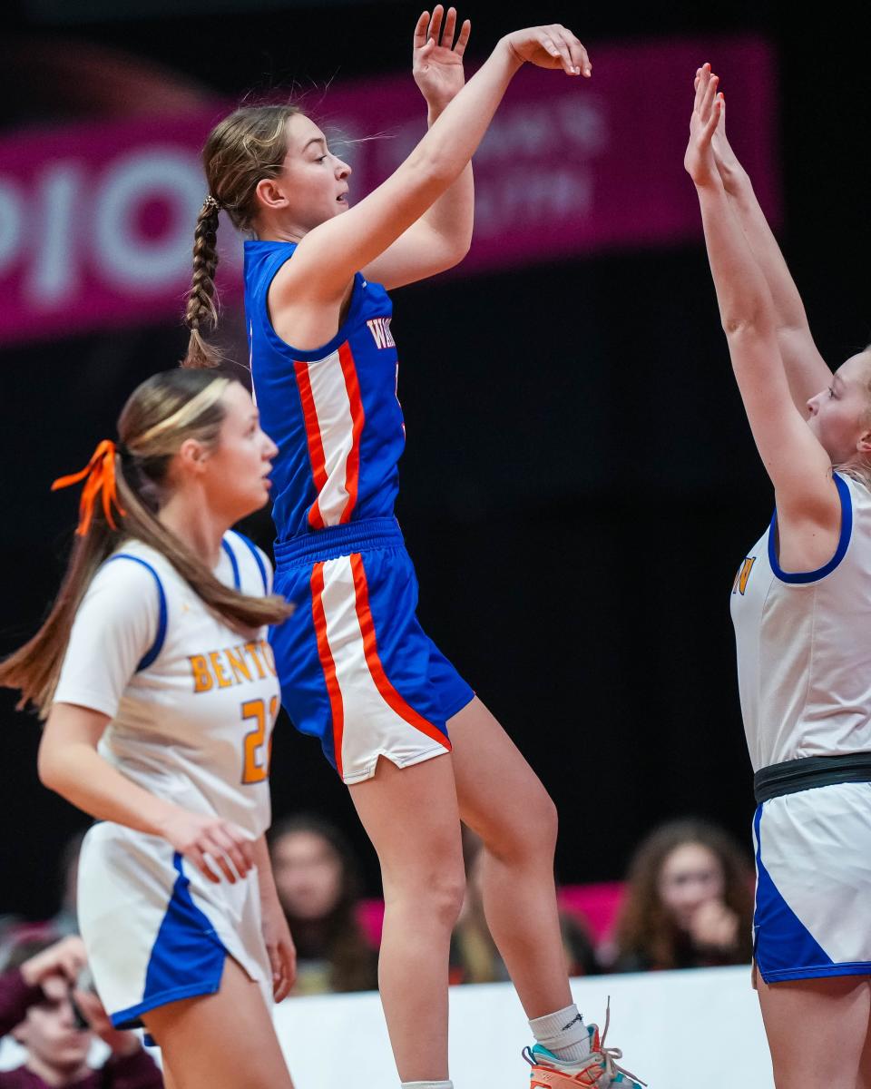 Sioux Center forward Makenna Walhof shoots over Benton guard Emma Townsley during the Class 3A championship game Friday.