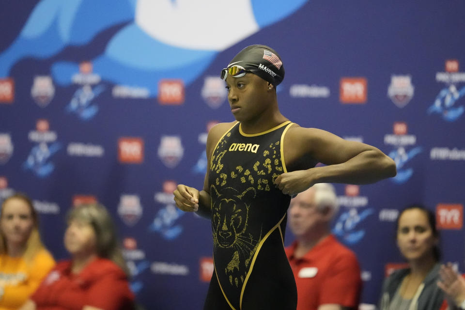 Simone Manuel prepares to compete at the Pro Swim Series event Thursday, Jan. 11, 2024, in Knoxville, Tenn. Manuel was the first Black female swimmer to capture an Olympic gold medal. Now she's coming back from a debilitating case of overtraining syndrome, her body breaking down in the leadup to the 2021 Tokyo Games. (AP Photo/George Walker IV)