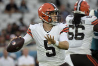 FILE - Cleveland Browns quarterback Case Keenum (5) looks for a receiver during the first half of an NFL preseason football game against the Jacksonville Jaguars in Jacksonville, Fla., in this Saturday, Aug. 14, 2021, file photo. Browns quarterback Baker Mayfield will sit out Thursday's game against the Denver Broncos with a painful left shoulder injury and backup Case Keenum will start. Cleveland announced the quarterback switch on Wednesday, Oct. 20, 2021, ending speculation about whether Mayfield would try to push through an injury to his non-throwing shoulder that he suffered last month and has worsened in recent weeks. (AP Photo/Phelan M. Ebenhack, File)