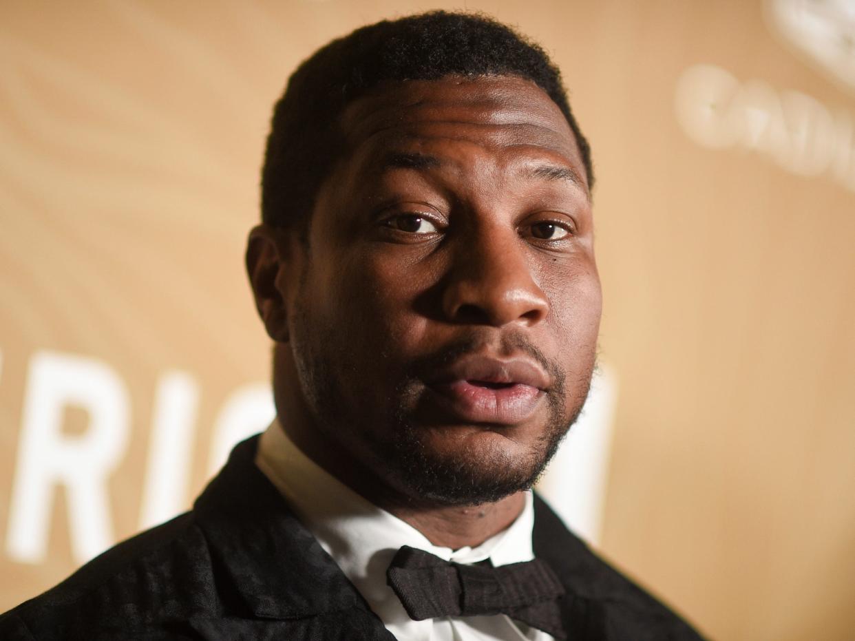 Jonathan Majors arrives at the American Black Film Festival Honors on March 5, 2023, at 1 Hotel in West Hollywood, Calif. Majors was arrested Saturday, March 25, in New York on charges of strangulation, assault and harassment after a domestic dispute, authorities said. Representatives for Majors said in a statement to The Associated Press that "he has done nothing wrong."